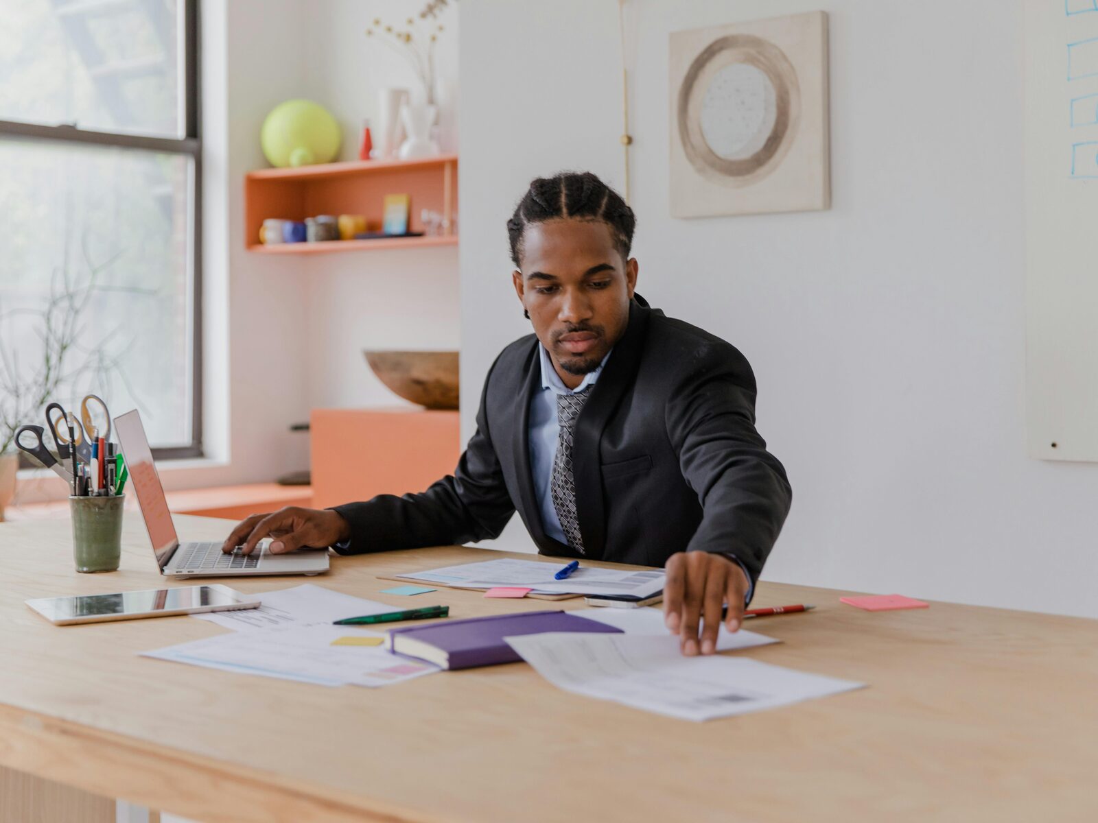 Business desk review scene representing planning and commercial software delivery